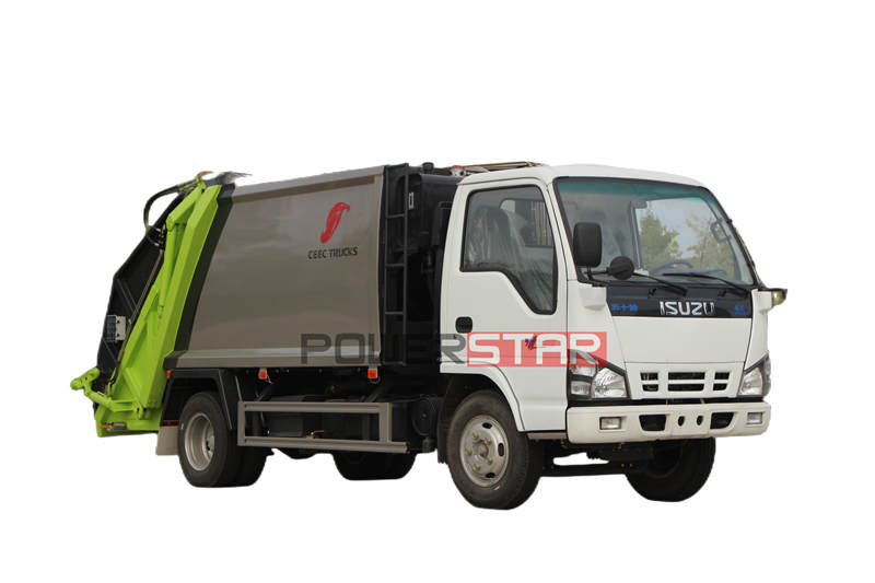 Truk pemadat sampah Isuzu 600P