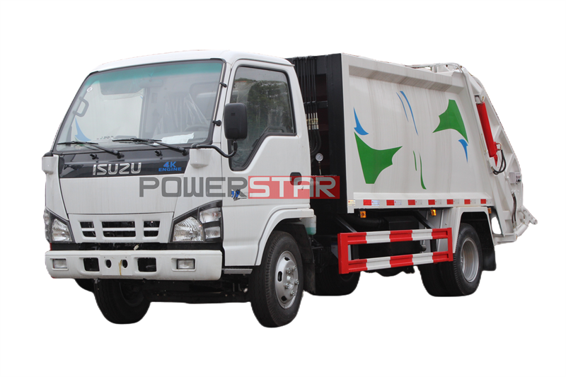 Truk pemadat sampah Isuzu 100P