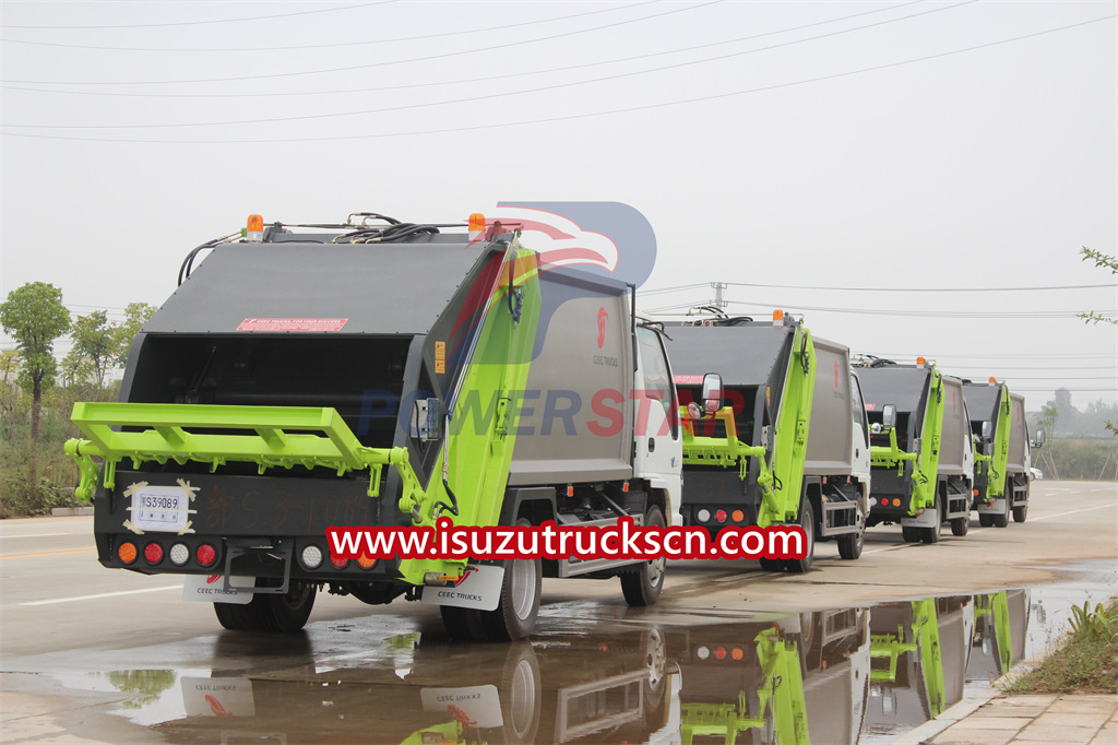 Harga truk pemadat sampah ISUZU NKR 6cbm