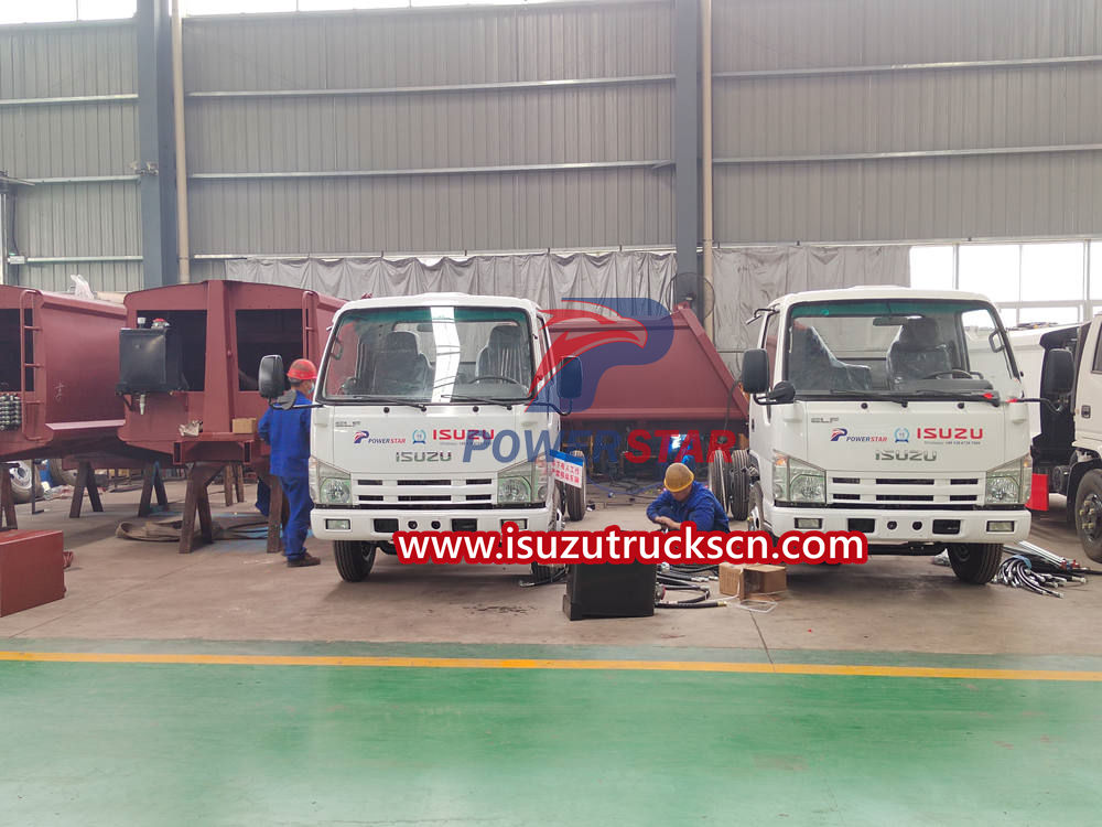 Truk pemuat belakang Isuzu