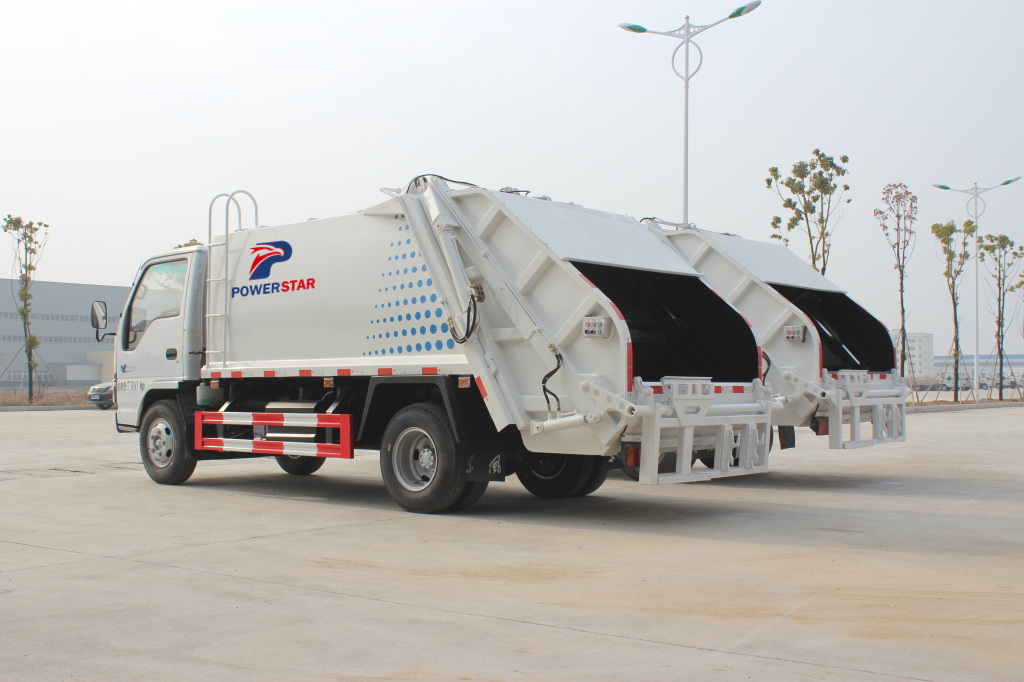 Truk pengumpul sampah Isuzu seberat 5ton yang dibuat oleh truk Powerstar
    