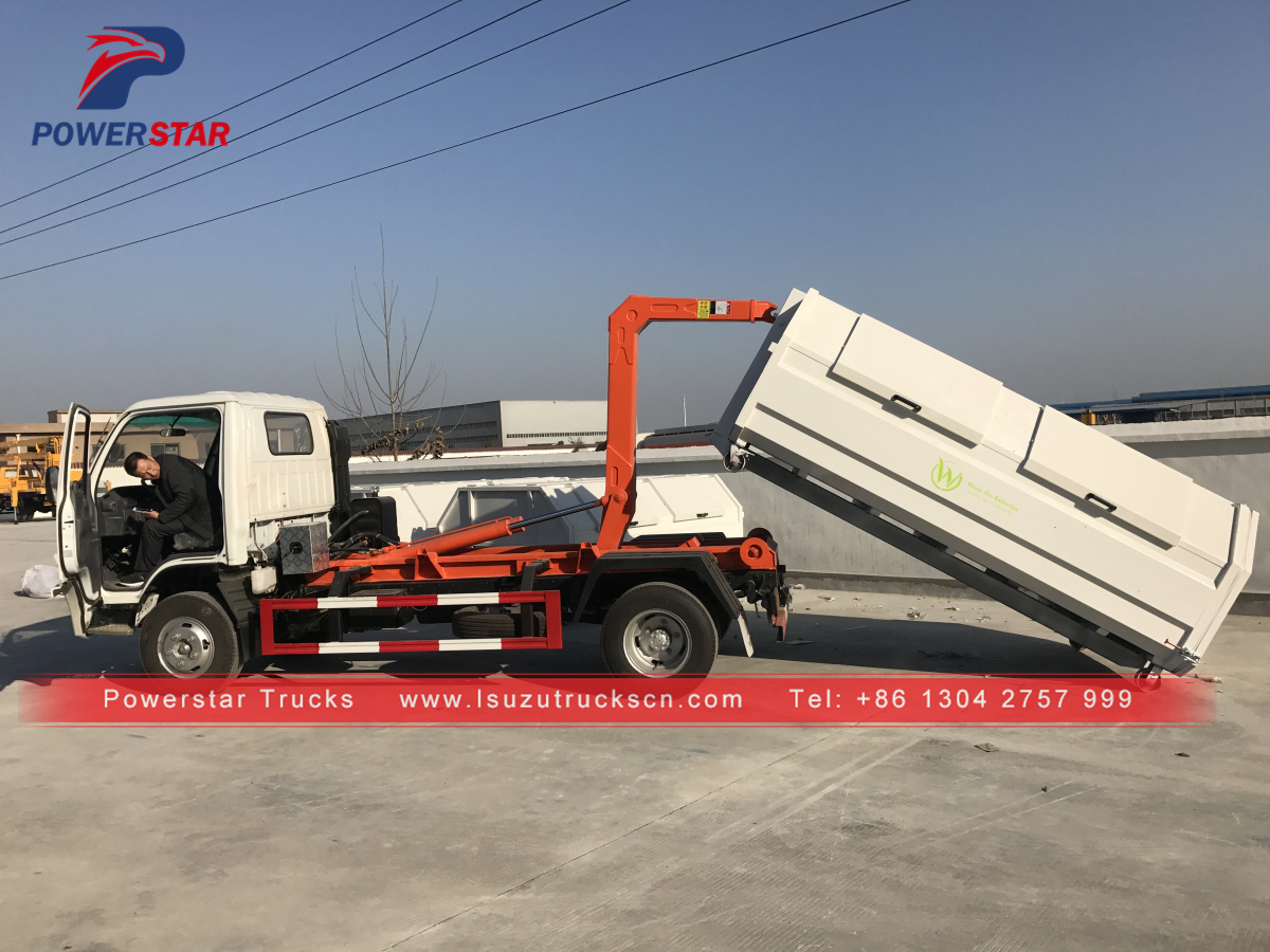 Truk Sampah Hooklift Isuzu 6roda merk Powerstar dengan Lengan Kait
    